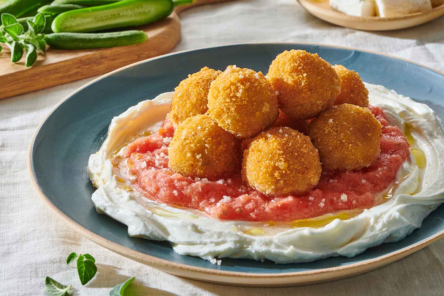 אָרַנְצִ'ינִי מִפְּתִיתִים וּגְבִינוֹת בְּצִפּוּי פָּרִיךְ